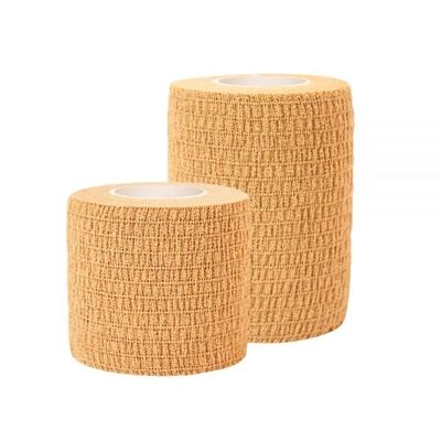 Individu amical de coton de peau adhérant le bandage élastique