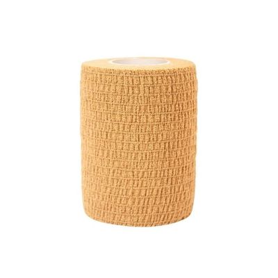 Individu amical de coton de peau adhérant le bandage élastique